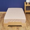 Drap housse Raphaëlle sur lit en bois