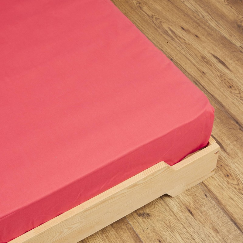 Zoom sur drap housse rose foncé