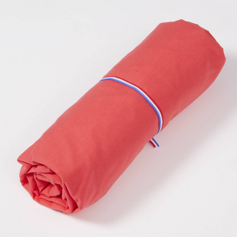 Drap housse rose foncé roulé