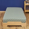 Drap housse Théodore sur lit en bois